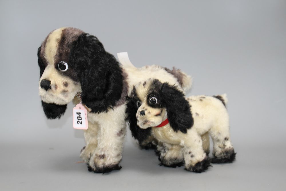 Two 1950s Steiff Cockie dogs, 33cm and 22cm